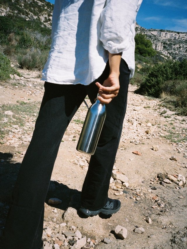Aarke Stainless Steel Bottle used outside in nature