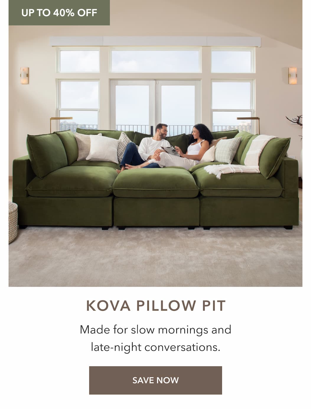 an image of a couple laying on a couch in a living room