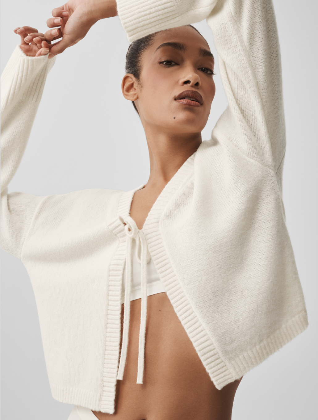 SWEATERS