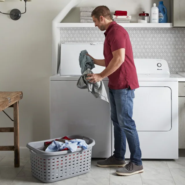 PERSON DOING LAUNDRY