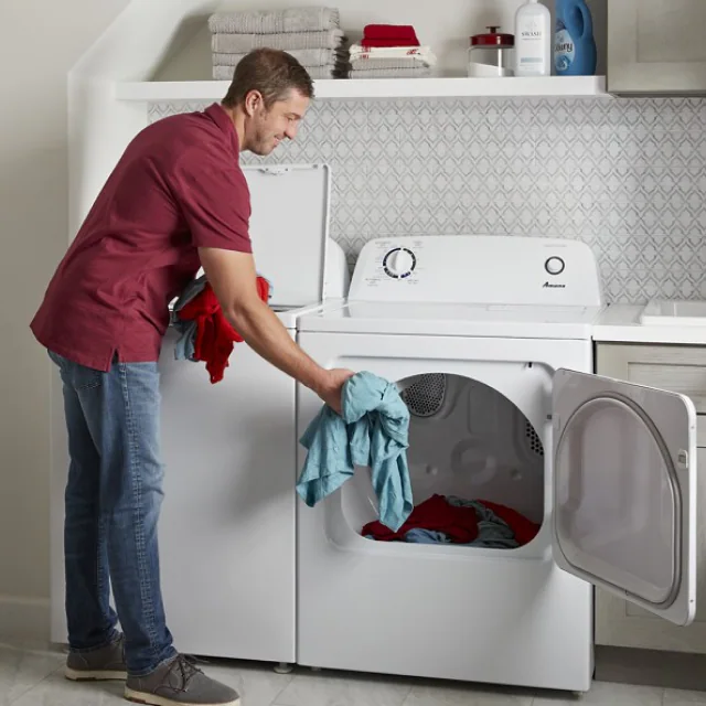 PERSON DOING LAUNDRY