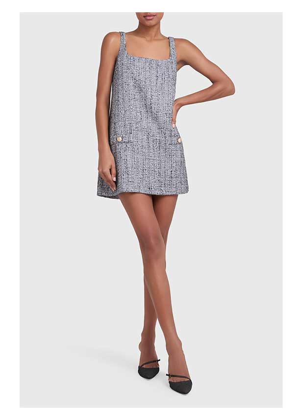 girl in a grey tweed dress