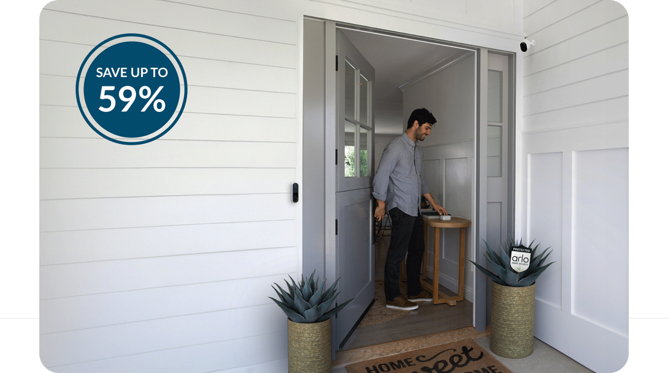 Up to 59% off. Person leaving their house through the front door as they arm the Arlo Home Security System. Various Arlo security products mounted nearby.
