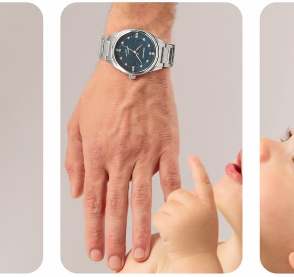 Father wearing the Knox Watch reaching for baby