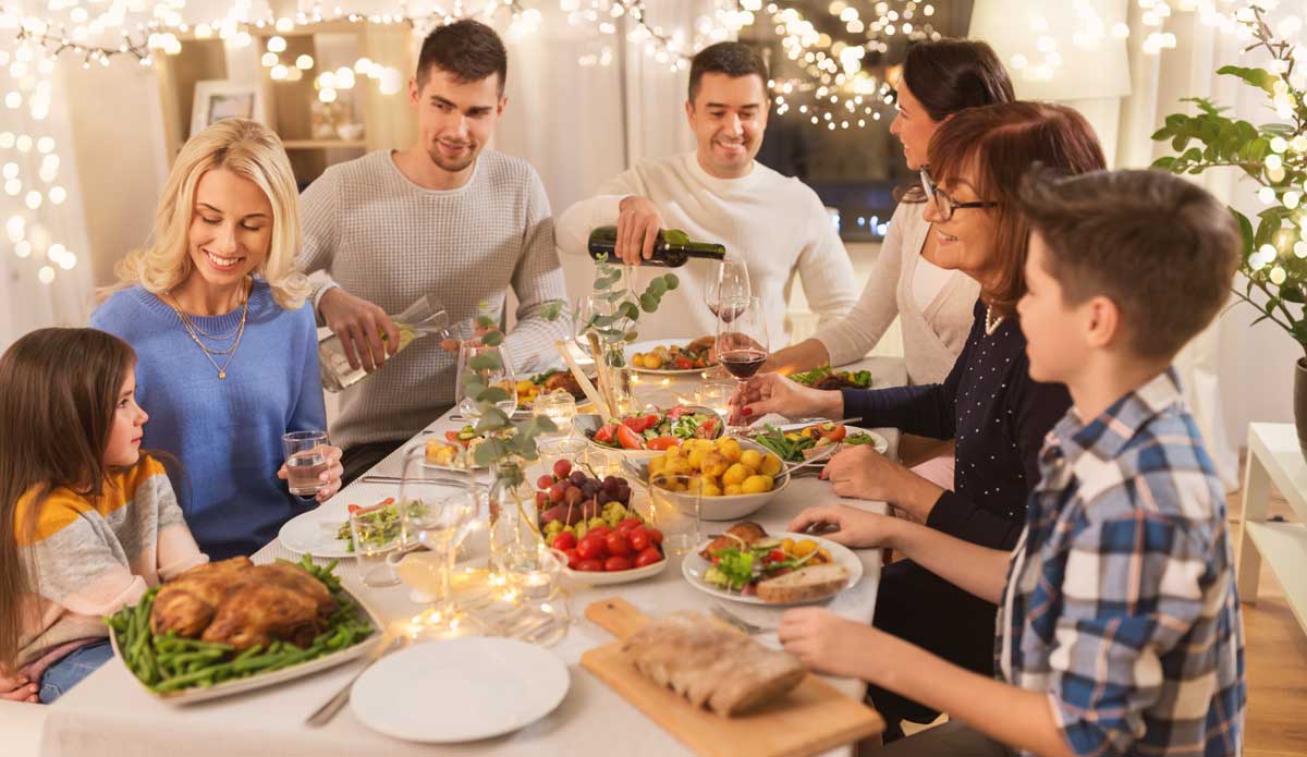 Extended family eating a holiday feast.