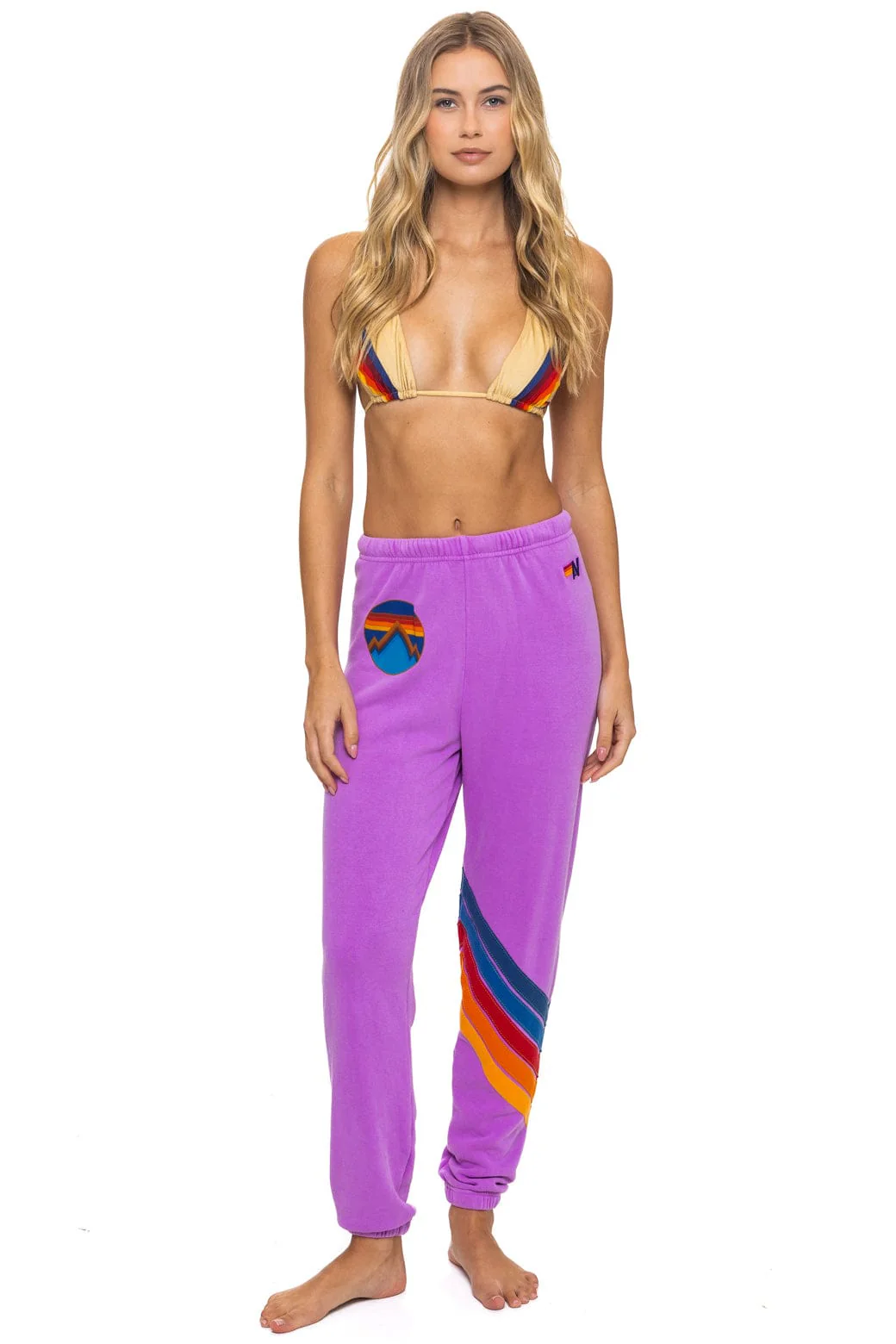 Image of ALL SEASONS CIRCLE CHEVRON SWEATPANTS - NEON PURPLE