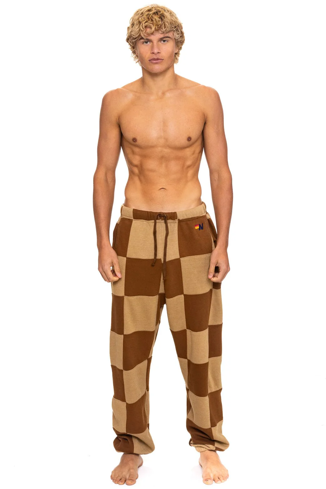 Image of CHECK QUILTED SWEATPANTS - TAN // CINNAMON