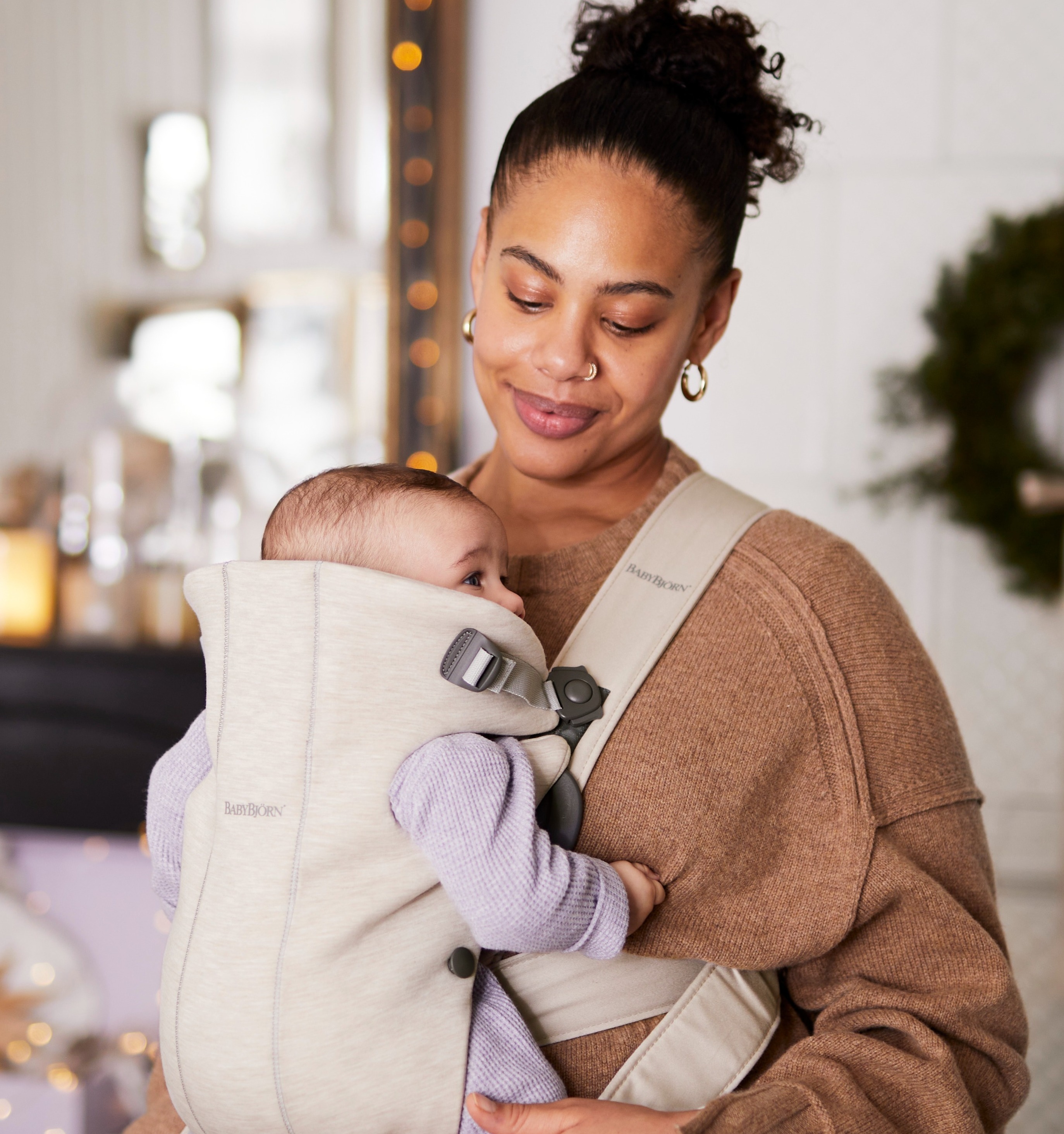 Woman babywearing with Baby Carrier Mini