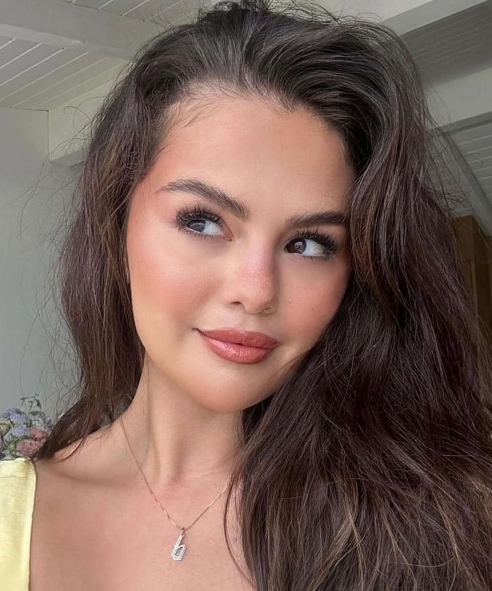 Selena Gomez wears the Diamond Gothic Old English Initial Charm