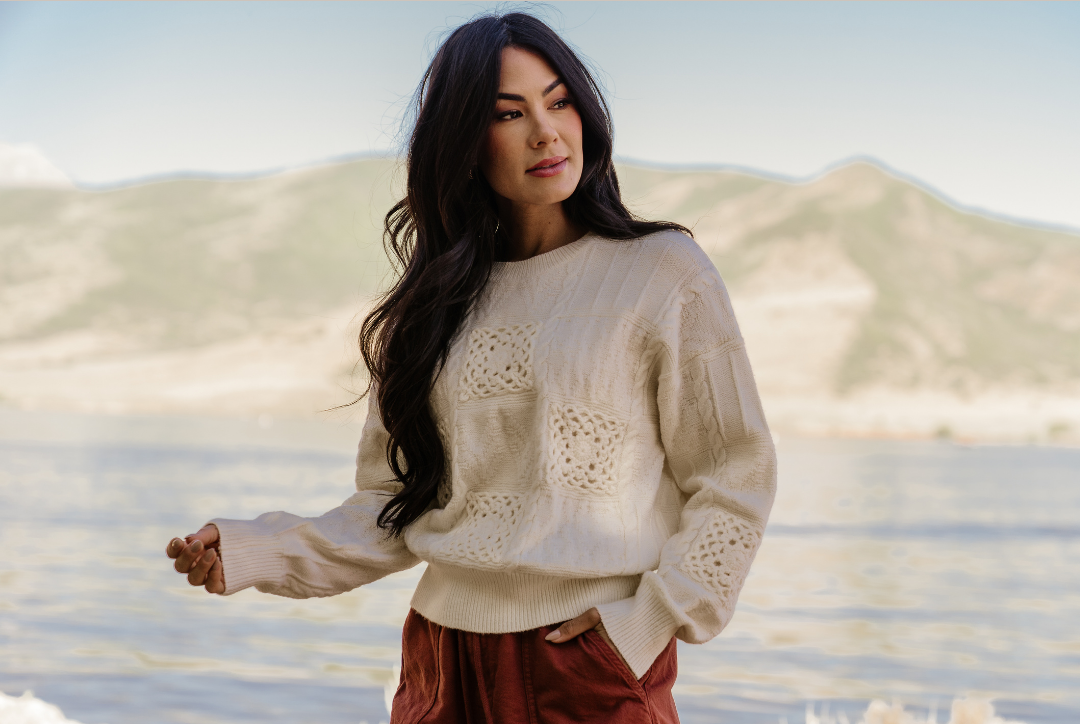textured cream sweater with knit detail. Gorgeous!
