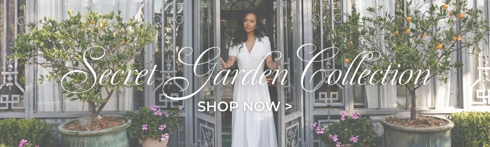 an image of a woman standing in front of a door with a sign that says secret garden collection