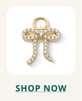 14K Gold Plated CZ Bow Necklace Charm. Click to SHOP NOW.