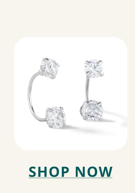 Pair of curved earrings with diamonds on end each. Click here to shop now