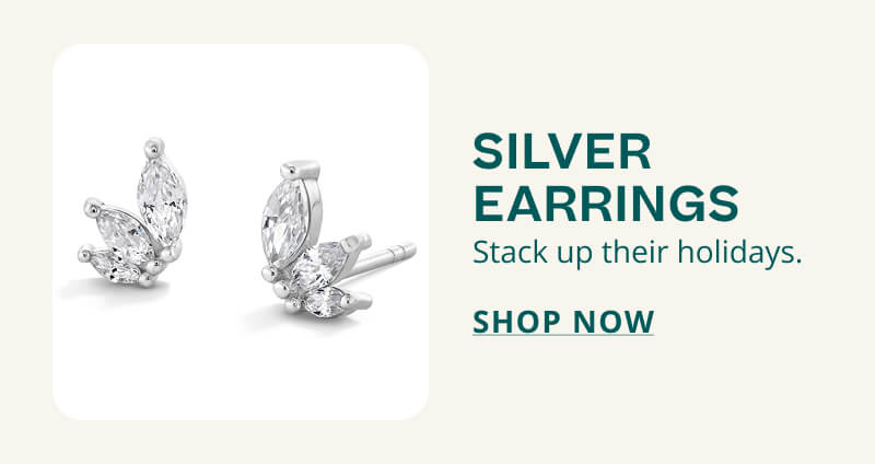 Silver clustered-petal studs. Silver earrings. Stack up their holiday. Click here to shop now