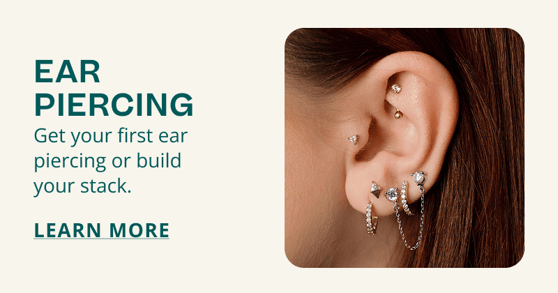 Model’s ear stack with number gold and diamond earrings. Ear piercing. Get your first or build a stack. Click here to learn more