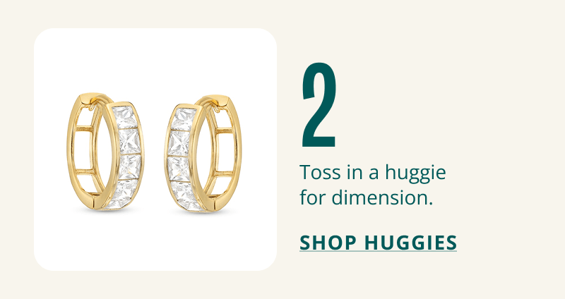 Gold huggie earrings with embedded square stones. Toss a huggie in for dimension. Click here to shop huggies