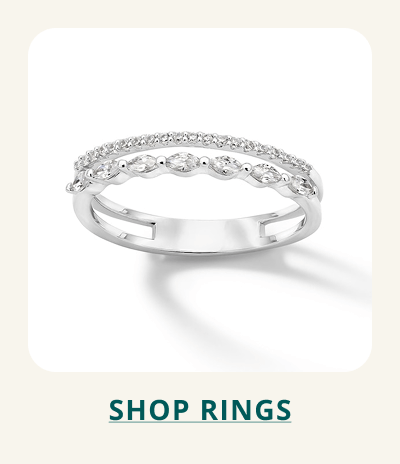 Dainty silver and diamond ring. Click here to shop rings