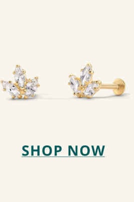A pair of cluster-style leaf-shaped studs in gold. Click here to shop now