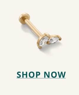 Gold, leaf-like diamond stud. Click here to shop now