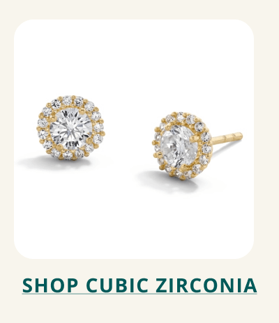 Gold, diamond detailed studs. Click here to shop cubic zirconia