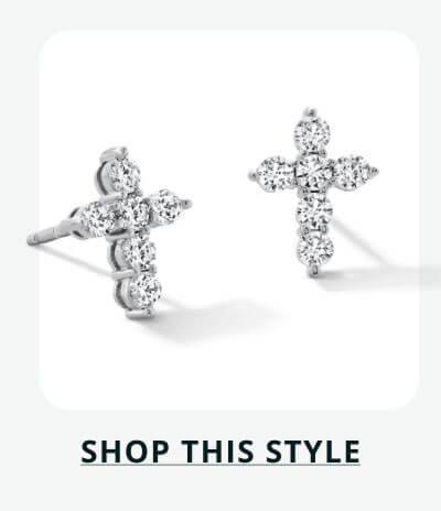Pair of small diamond cross studs. Click here to shop this style
