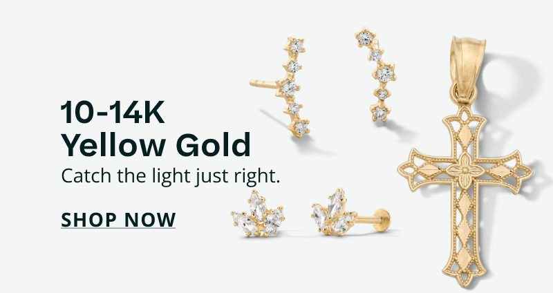Gold cross pendant & diverse gold studs with diamond clusters.10-14K yellow gold. Catch the light right. Click here to shop now