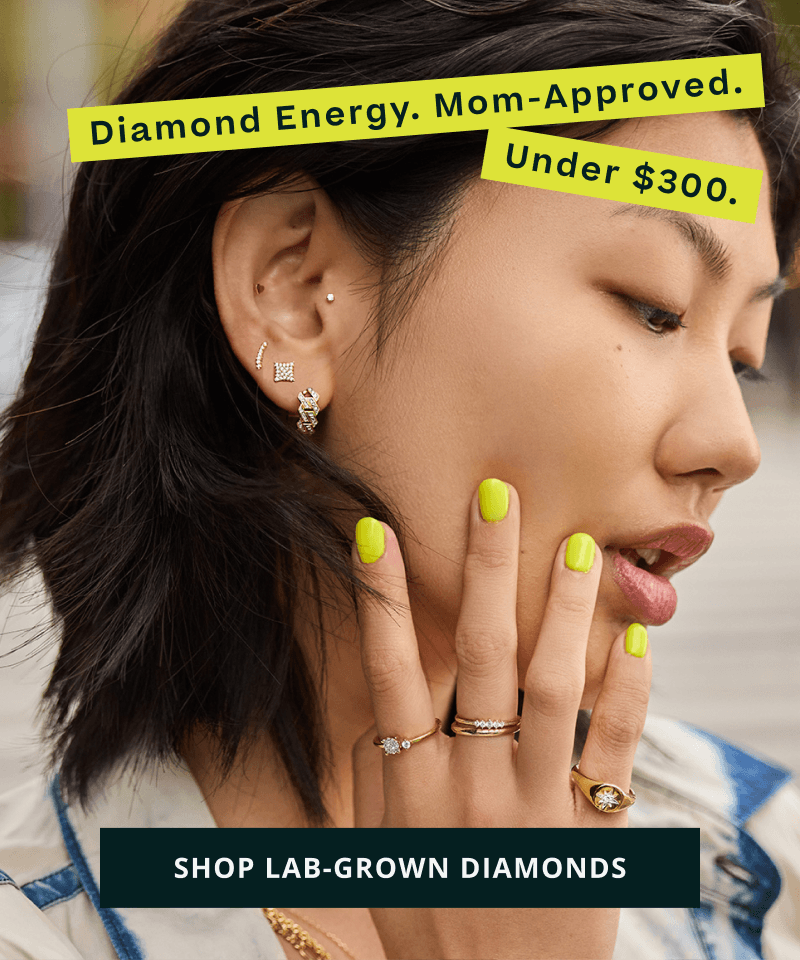 Model in gold accented with diamond styles, featuring pavé studs & rings. Diamonds for Mom, under $300. Click here to shop lab-grown diamonds 