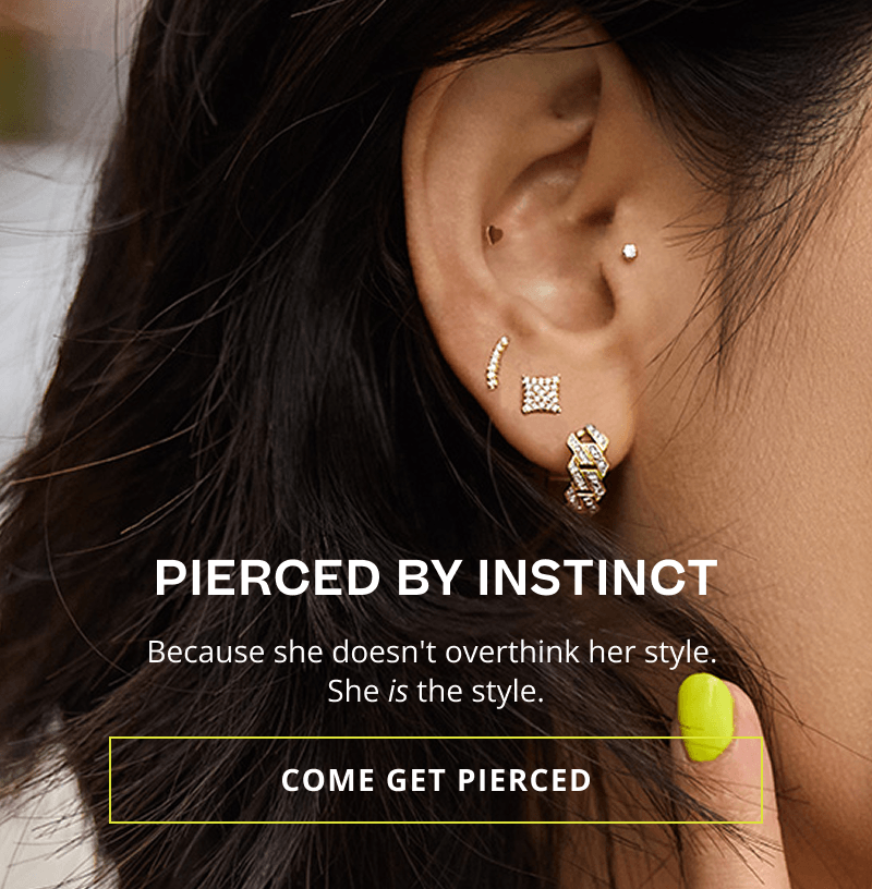 A gold & diamond ear stack mixing textures with a link hoop & heart stud. Pierced by instinct. She is the style.  Click here to come get pierced