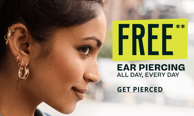 Model’s bold, edgy gold ear stack. Free ear piercing, all day. Click here to come get pierced