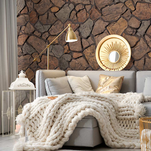 Anson fieldstone faux stone wall panels seen in accent wall in living room design