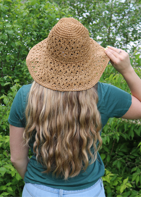 Woman wearing Straw Braided Bucket Hat outside