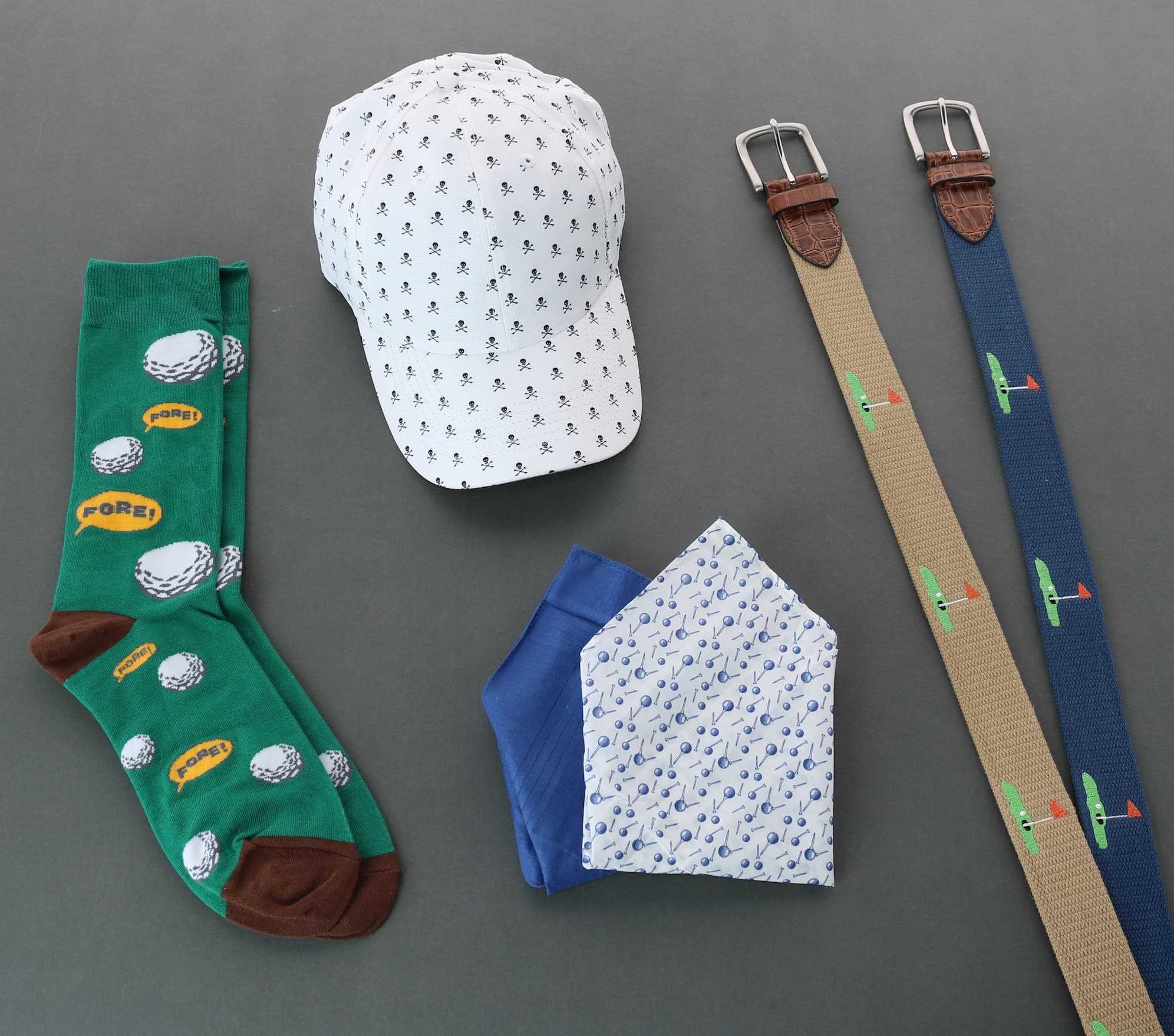Golf theme accessories including socks, hankies, hat and two belts