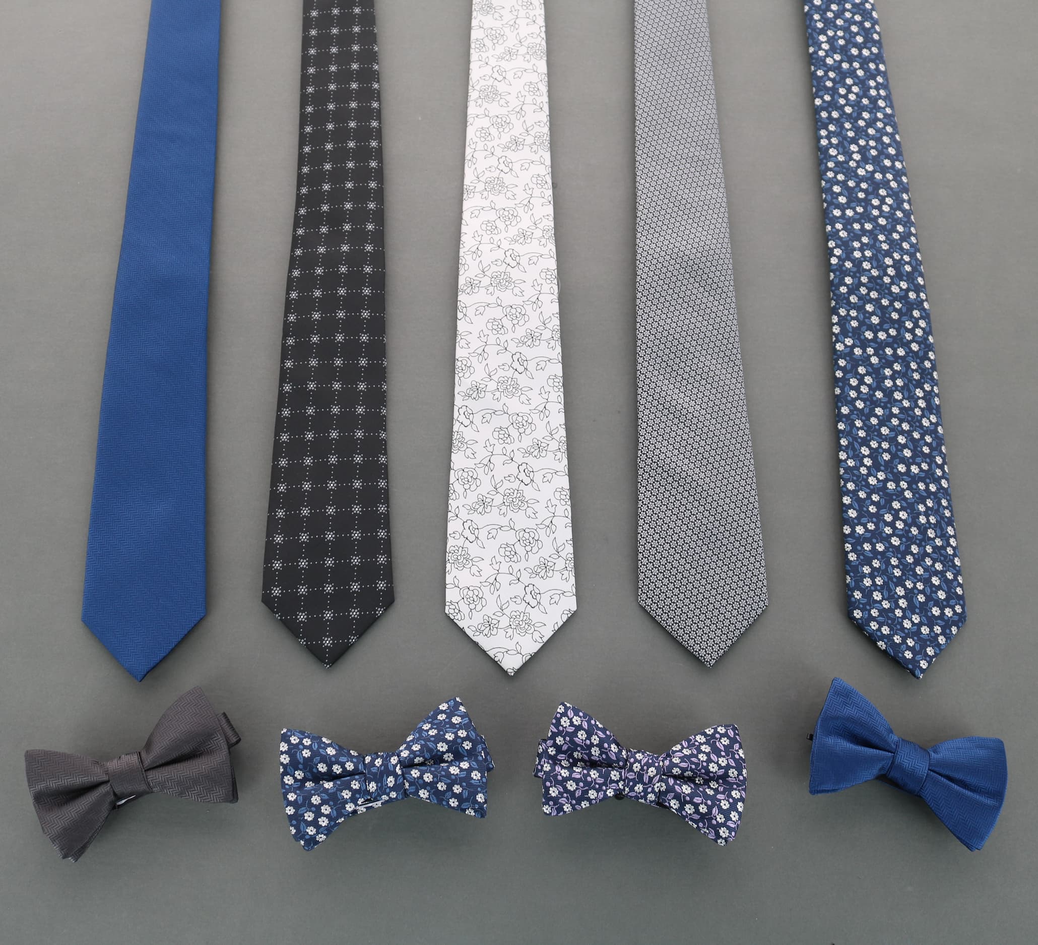 Men's formalwear accessories featuring bowties and pocket squares