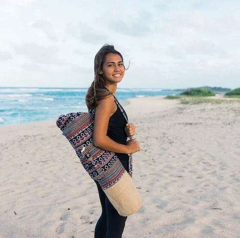 Woman using rice love yoga mat