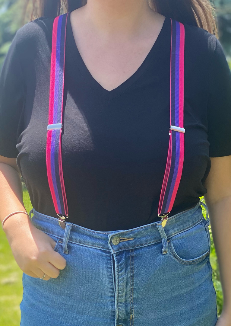 Woman wearing pink and purple clip end braces