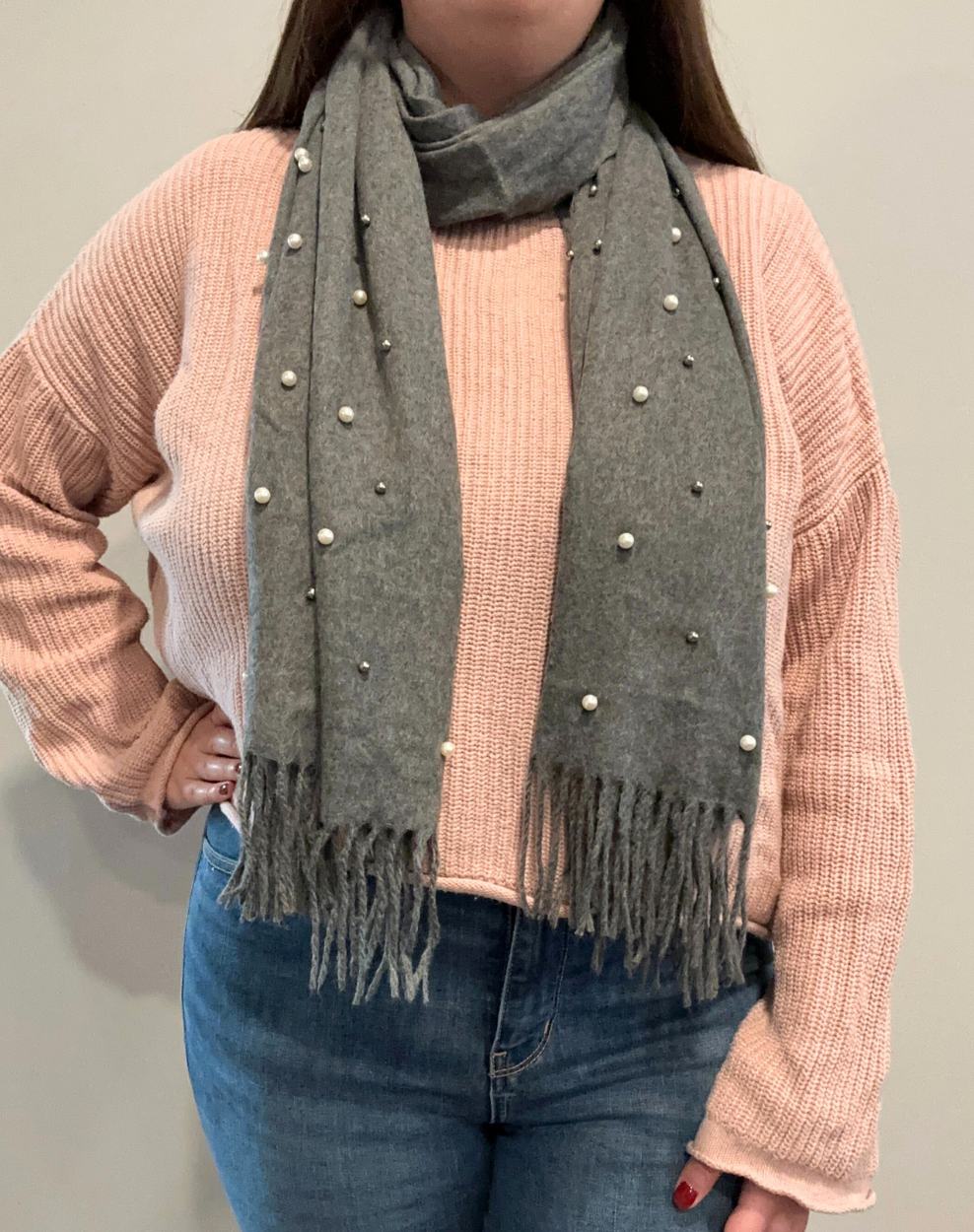 Woman wearing CTM® Women's Pearl Embellished Solid Fringe Oblong Scarf