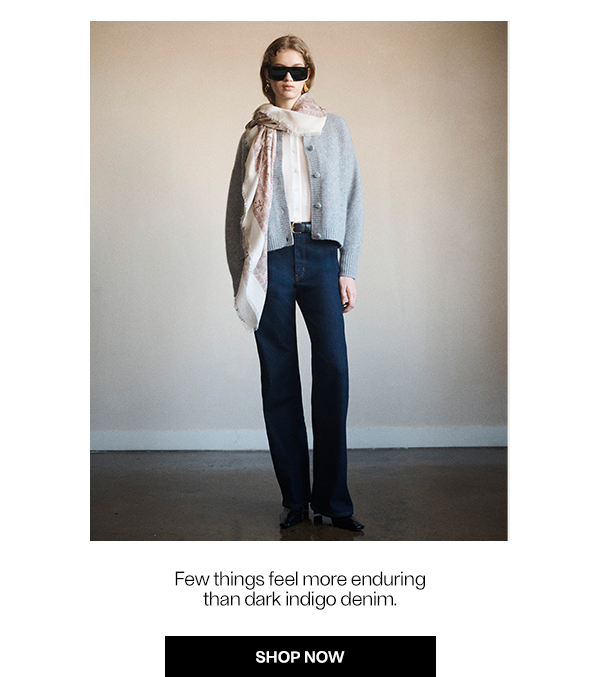 Few things feel more enduring than dark indigo denim. - Shop Now; Model weras Frame denim