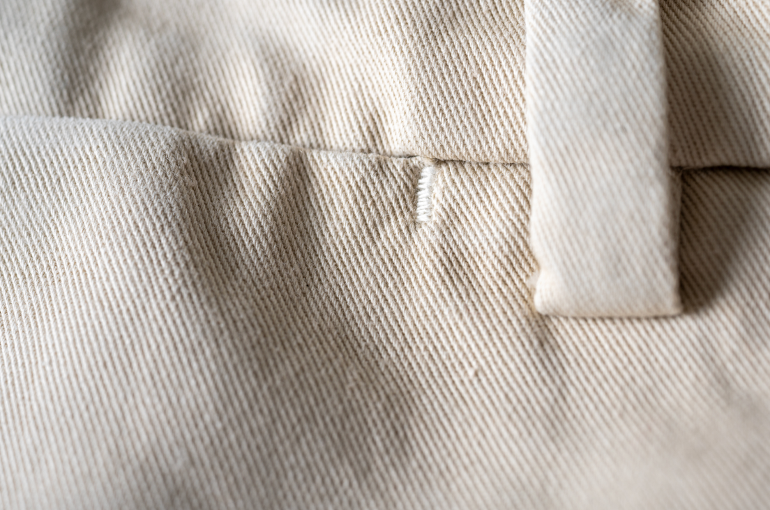 A close up of Khaki Bills Khaki Heritage Wash shorts belt loop and waste seam