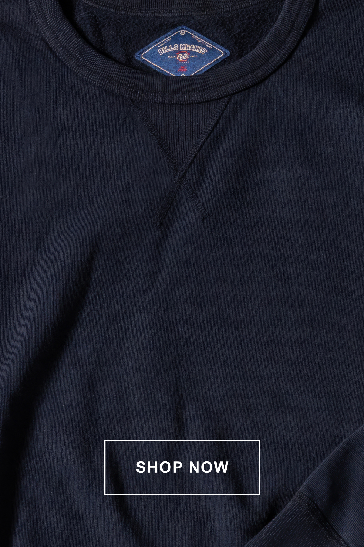 A close up on a navy Bills Khakis Classic 100% Cotton Crewneck