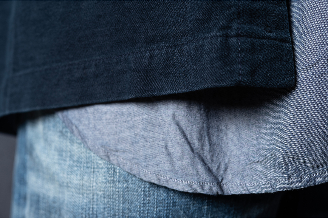 A detail of Bills Khakis Indigo overshirt, denim and standard fit shirt