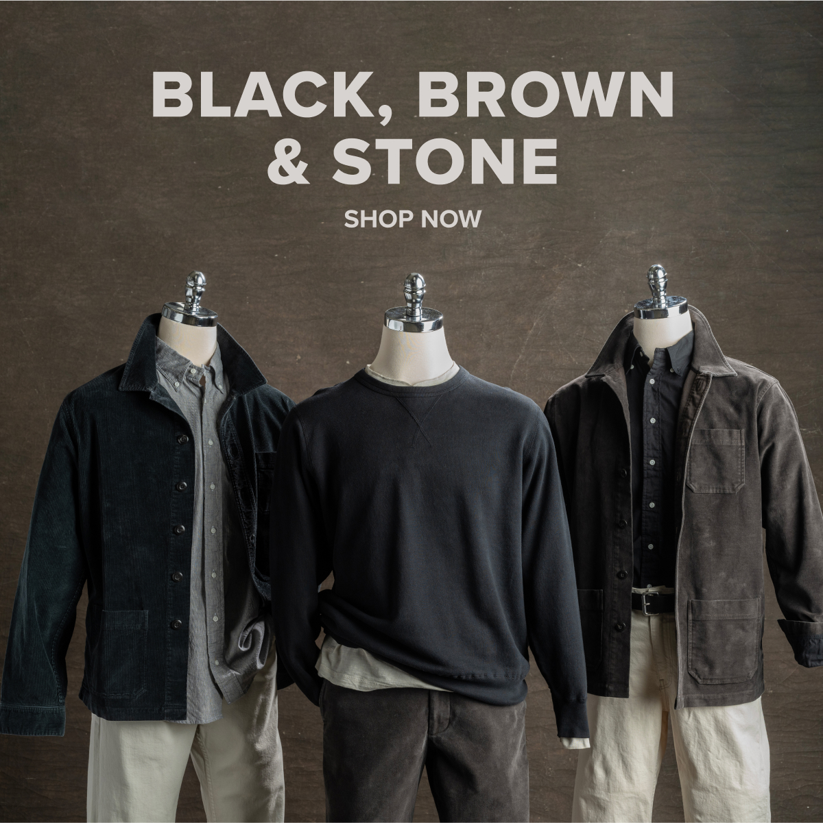 Three mannequins sit outfitted in black, brown & stone Bills Khaki outfites from top to bottom - including chore jackets, over shirts, standard fit shirts, pants and belts. Text reads: Black, Brown & Stone | Shop Now.