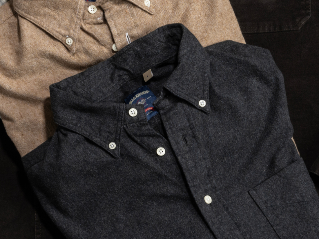 A detail of a dark black and brown Bills Khakis standard fit shirt
