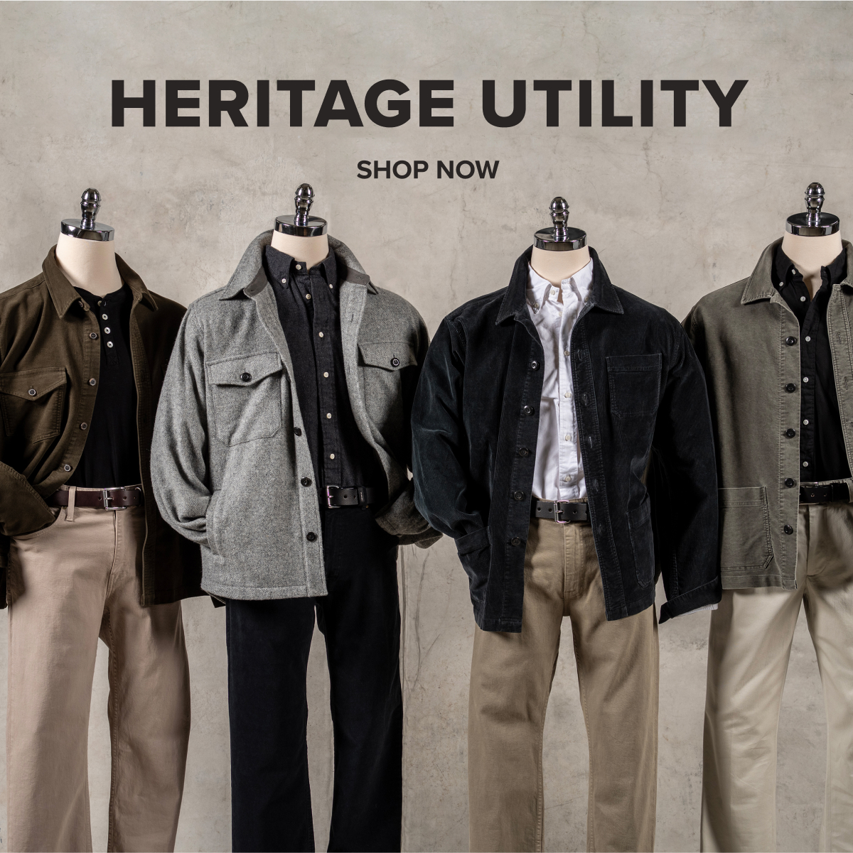 Four mannequins posed against an industrial wall wearing Bill Khakis tops, belts, and pants in olive, grey and black tones. Text reads: Heritage Utility | Shop Now