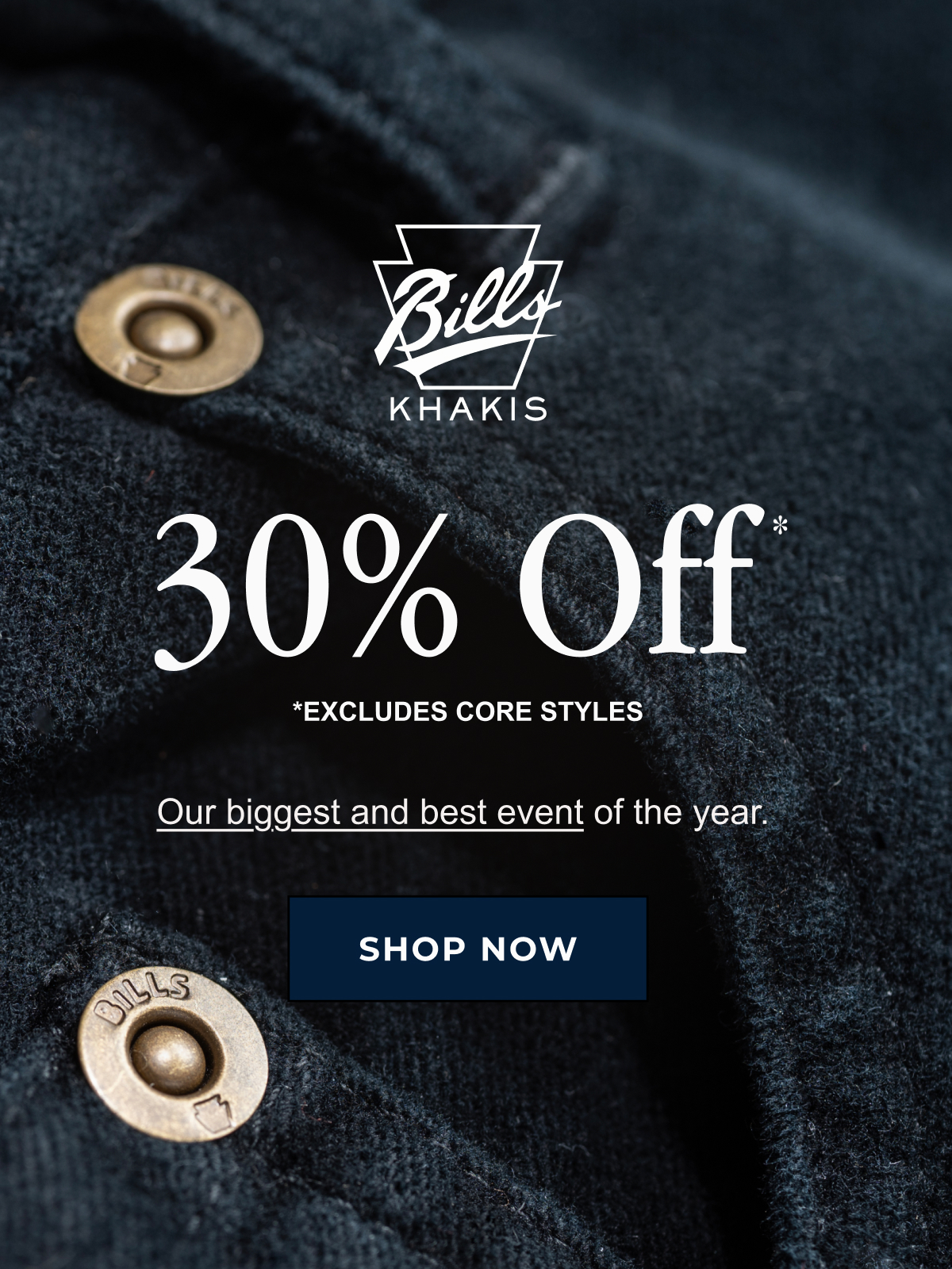 A close up of a navy pair of Bills Khaki pants showcasing the pocket and belt loop stitching alongside Bills Khakis branded rivets. The Bills Khaki logo overlays the image along with text that reads: 30% Off* | *Excludes Core styles | Our biggest and best event of the year | Shop Now