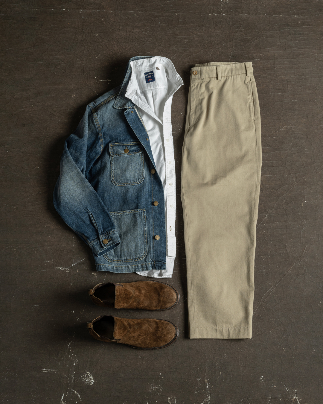 A pair of Bills khakis khakis paired with denim jacket and white standard fit shirt