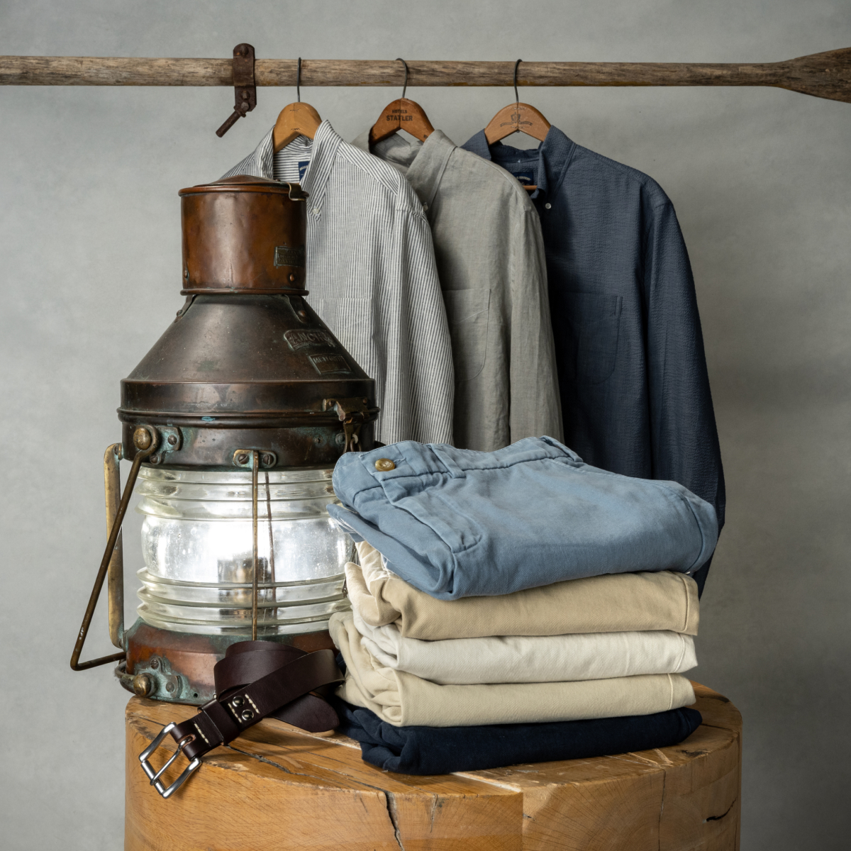 A preview of the Bills Khaki Spring 2026 collection amongst vintage objects and neutral grey backdrop