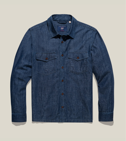 A product shot of a Bills Khakis light denim over shirt
