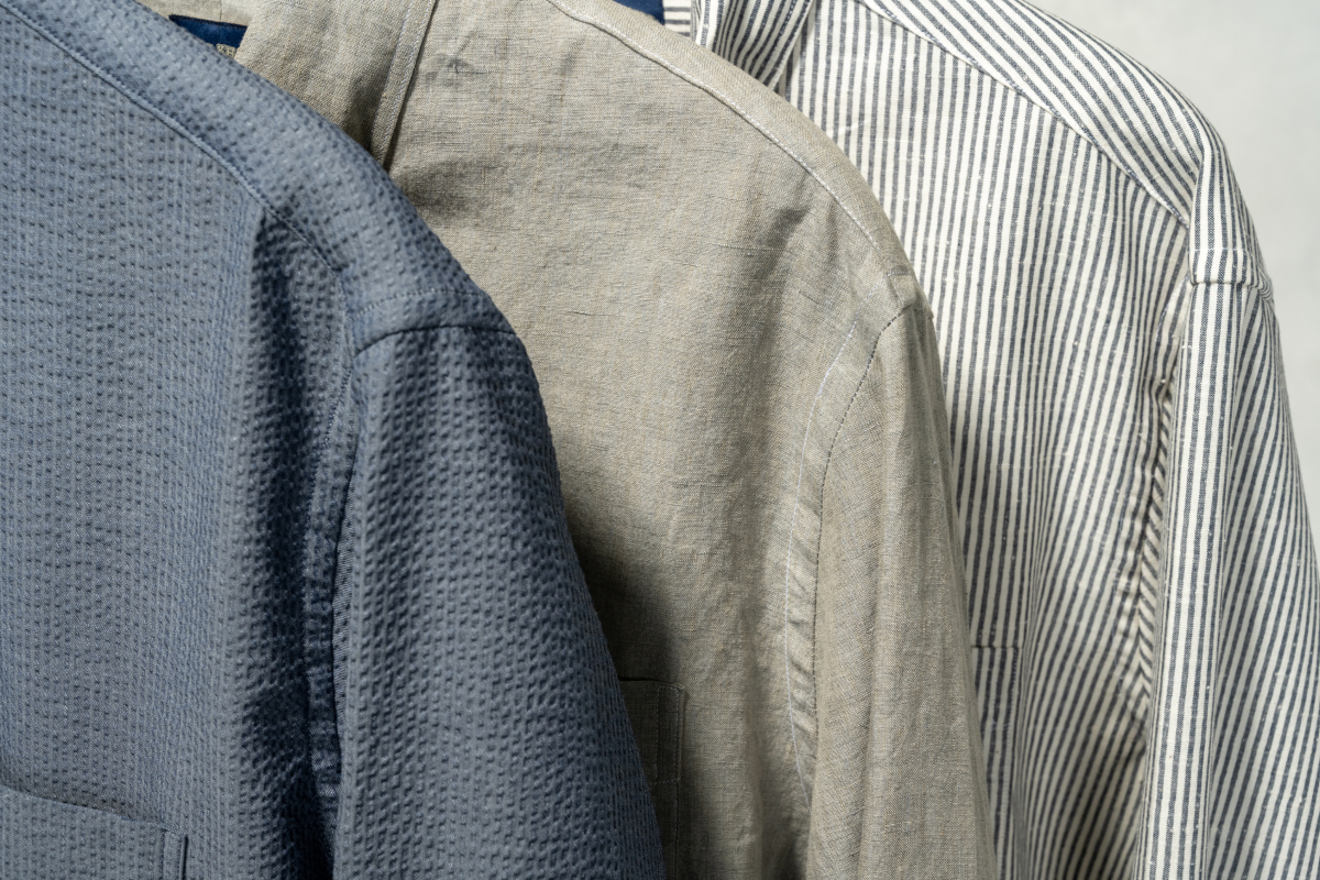 Closeup shots of the shoulder seams of the new Bills Khakis Seersucker, linen and cotton shirts.