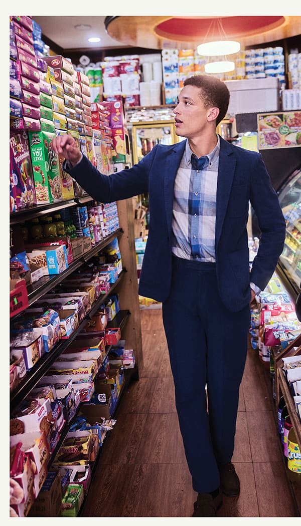 man wears billy reid inside of a bodega