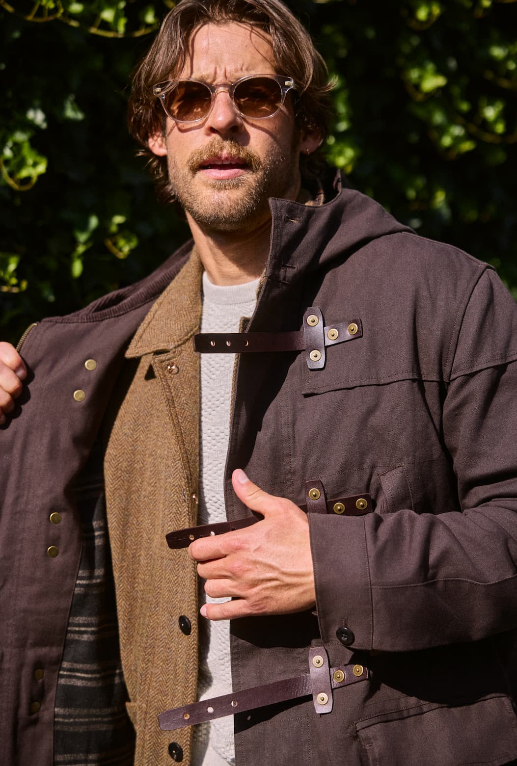 Model wears the Waxed Canvas Duffle Coat, layered over the Wool Herringbone Chore Coat.